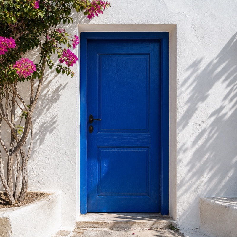 A weathered blue door